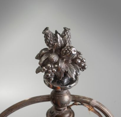 null A large silver plated bronze lamp stand, the baluster shaft decorated with twisted...