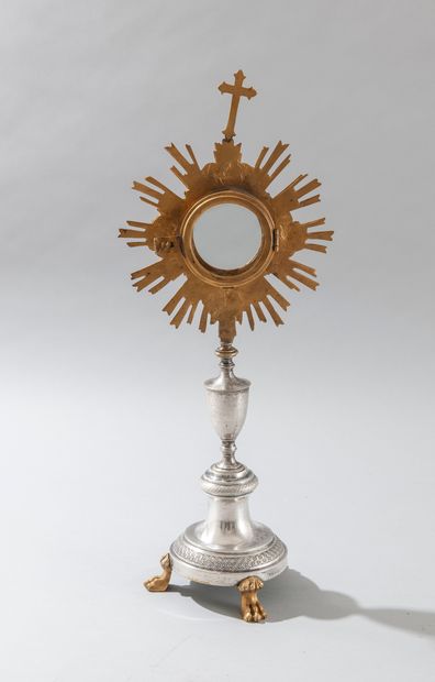 null Silvered and gilt bronze monstrance, the tripod base with claw feet and decorated...