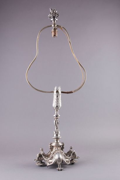 null A large silver plated bronze lamp stand, the baluster shaft decorated with twisted...