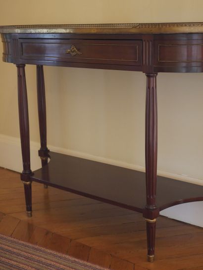 null A Louis XVI style mahogany and mahogany veneer console table opening to a drawer...