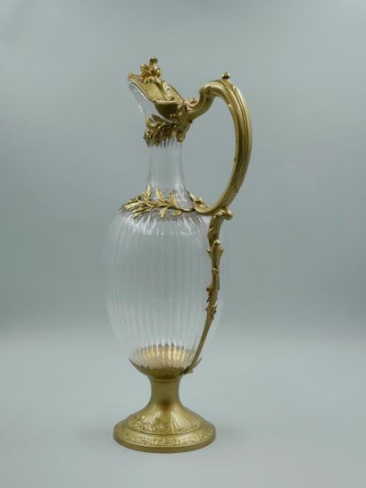 null Crystal ewer, the silver and vermeil frame painted with gold paint and decorated...