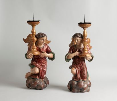null Pair of cerulean angels in polychrome and gilded wood. Kneeling on a cloud,...