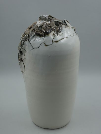 null VASER Célestin (XXth). Vase "Apocalypse" in ceramic with white glaze, the neck...