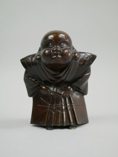 null Japon. Période MEIJI (1868-1912). Okimono en bronze à patine brune représentant...