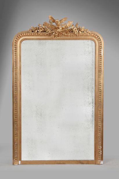 Large molded wood mirror, carved and gilded,...