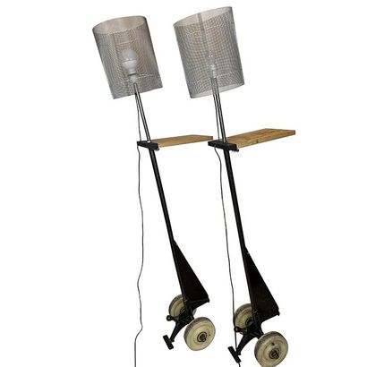null Two floor lamps in black lacquered metal and wood. Height 175cm. Worn
