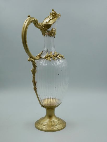 null Crystal ewer, the silver and vermeil frame painted with gold paint and decorated...