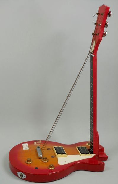 null Guitar Erection, Sculpture made from an electric guitar, titled and dated 2004....