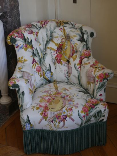 null Set including a fabric crapeau armchair with flower bouquets and music attributes...