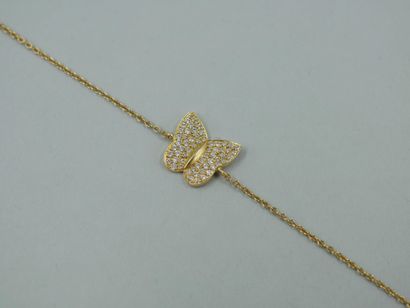 null Bracelet en or jaune 18K à motif d'un papillon pavé de diamants - Longueur :...