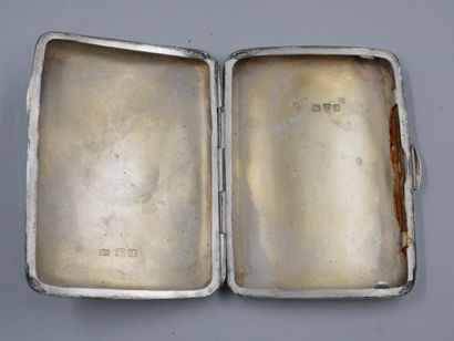 null Cigarette case in English silver with flowers and interlacing topped by a red...