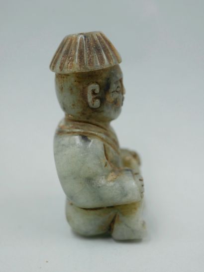 null Child with hat that is 

amulet during fertility small various remains of concretions....