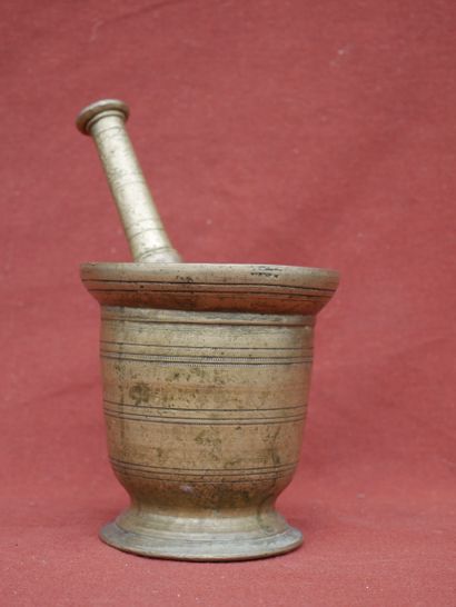 null Gilt bronze mortar on a pedestal with a bulging neck.