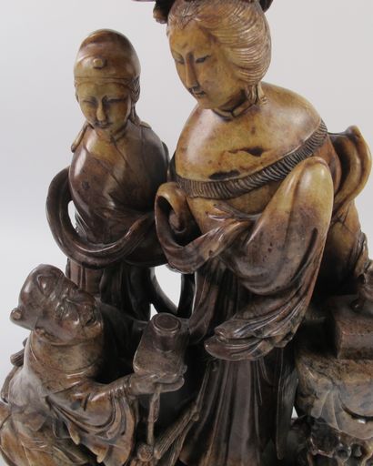 null Composition with the Lady of the Court. Brown patinated soapstone. H 37cm. L...