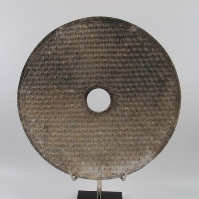 null Large Bi disc chiseled with seeds that sprout in relief, symbol of rebirth....