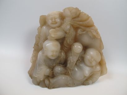 null Composition of the God Hotei and two karakos. Translucent creamy white soapstone...
