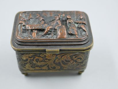 null Lot: 

- Silver plated box representing a tavern scene in low relief on the...