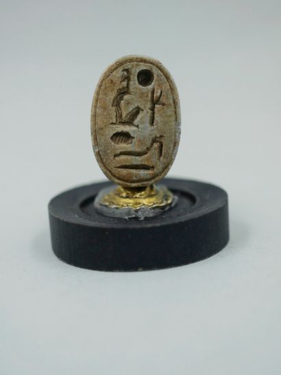 null Scarab inscribed with the name of Ramses II. Soapstone or other. About 2cm.