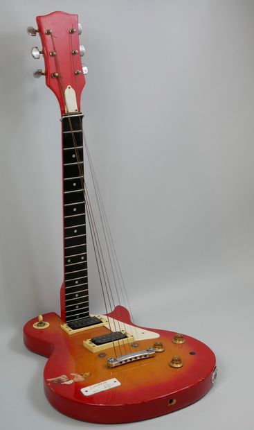 null Guitar Erection, Sculpture made from an electric guitar, titled and dated 2004....