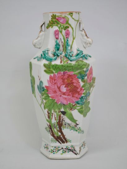 null China, 20th century, mark on the back. Hexagonal vase decorated with flowers,...