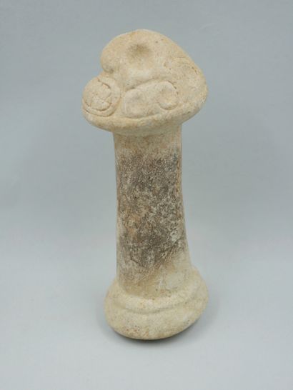 null Pestle decorated with a head of the god Zemi. Limestone. First millennium of...