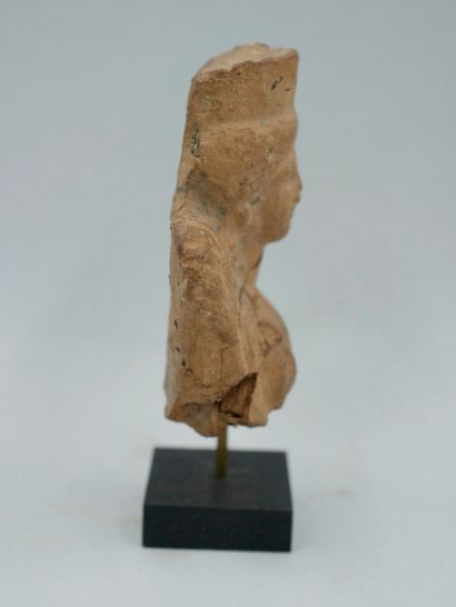 null Bust of the Goddess Korée 

holding a palm.terracotta. Archaic Greek art. H...