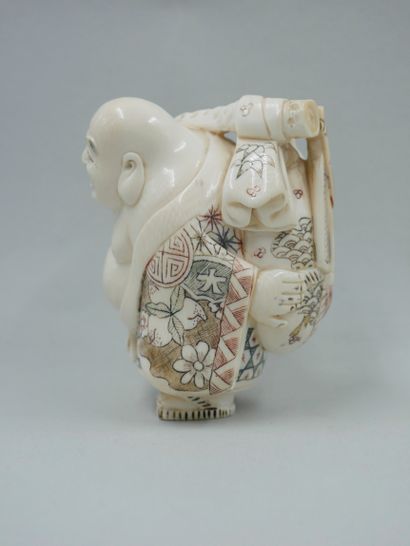 null JAPAN, early 20th century. Standing prosperity Buddha in elephant ivory (elephantidae...