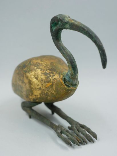 null Ibis lying down in devotion.

Thoth ibis, God of Knowledge and Learning. Bronze...