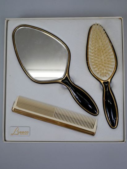 null Toiletries set composed of a mirror, a brush and a comb decorated with a silk...