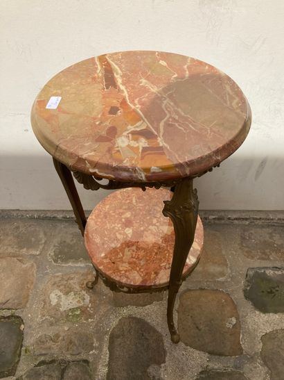 null A tripod side table with marble top. Height 73,5 cm, diameter 39 cm.