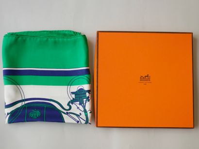 null HERMES Paris. Silk square "Calèche" decorated in blue and green tones. Signed....