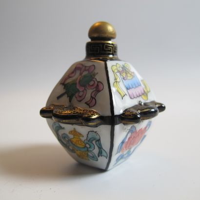 null Three porcelain and enamel flasks. Elephant (h 6 cm), octahedron with 8 Buddhist...