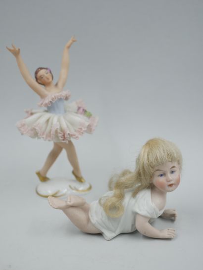 null Small porcelain dancer and miniature porcelain doll. Late 19th - early 20th...