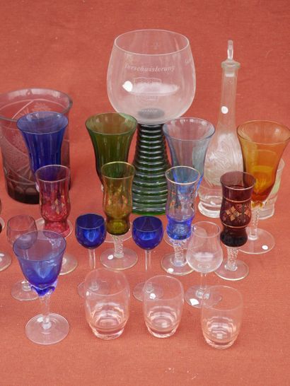 null Lot of glassware and colored crystal, including water glasses, wine glasses...