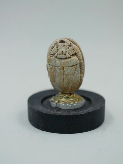 null Scarab inscribed with the name of Ramses II. Soapstone or other. About 2cm.