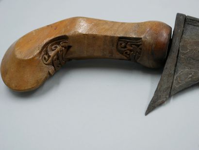 null Kriss. Carved wooden handle and iron blade made of meteorite alloy called "dragon...