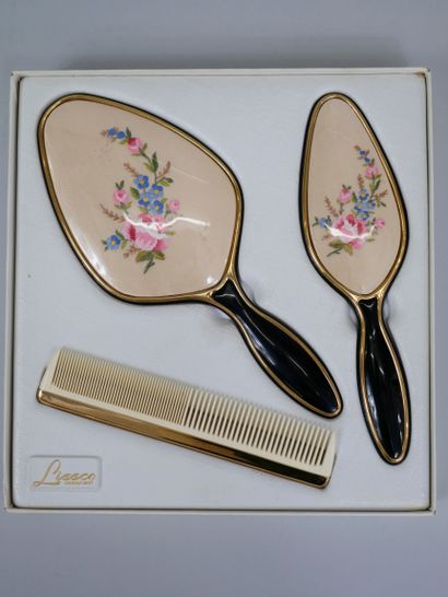 null Toiletries set composed of a mirror, a brush and a comb decorated with a silk...