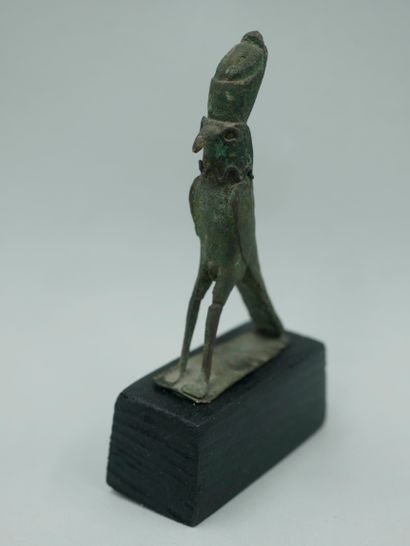 null Falcon god Horus wearing the double crown of the two kingdoms. Late Period style....