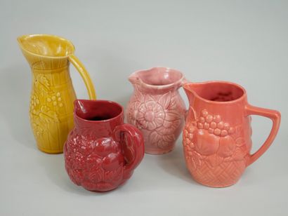 Lot of four jugs in barbotine with plain...