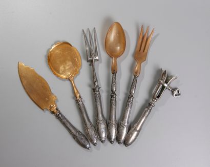 null A set of Louis XIV style silver flatware including two pieces of fish service,...