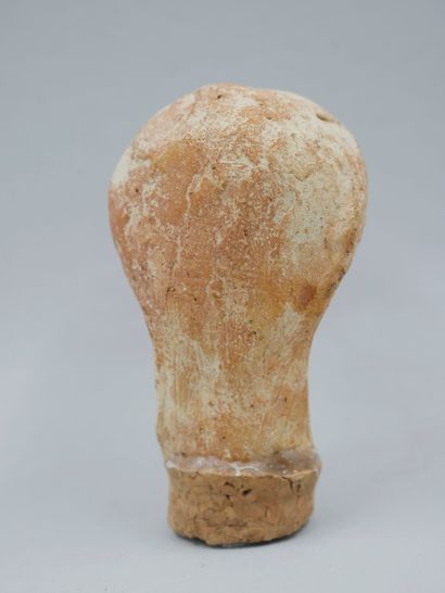 null Head with headband. Terracotta in the Grecoetruscan style.

Approx. H: 7cm