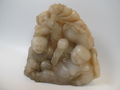 null Composition of the God Hotei and two karakos. Translucent creamy white soapstone...
