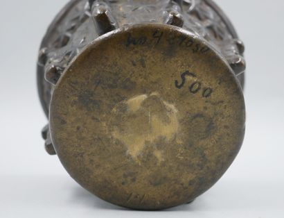 null Bronze mortar with brown patina and stars decoration. 19th century. Height:...