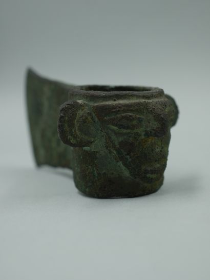 null Decorated with a human head.Vicus or Mochica period.Bronze or alloy. Width:...