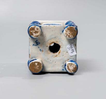 null DELFT. Earthenware base of quadrangular form decorated in blue camaieu of four...