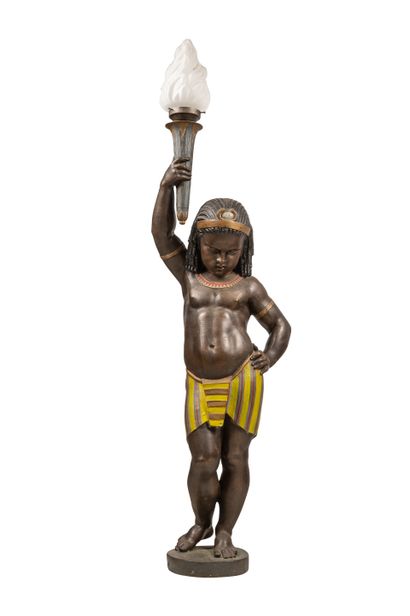 null 
Important pair of cast iron torchholders with Egyptian children in polychrome...