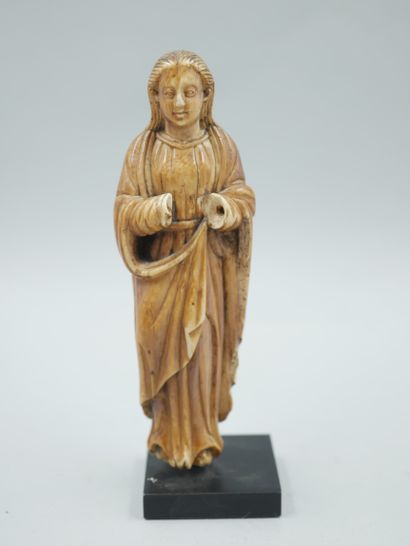 null Indo-Portuguese work. 17th century. Virgin in ivory. Height: 12,5cm. On a base....