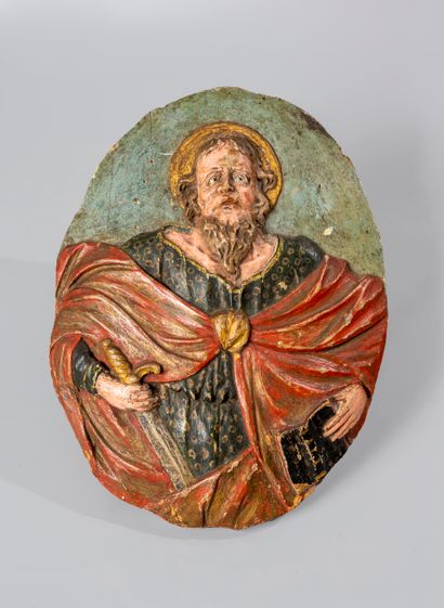 null Pair of oval polychrome wood panels representing Saint Peter and Saint Paul....
