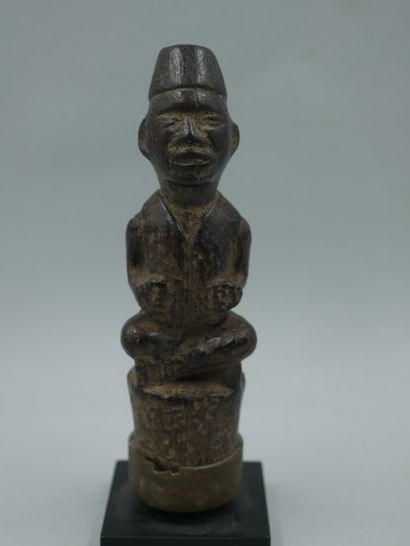 null DEMOCRATIC REPUBLIC OF THE CONGO. Wooden cane top, representing a chief sitting...