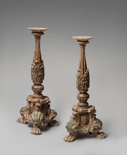 null Pair of tripod candlesticks in cream lacquered cast iron. The shaft with acanthus...